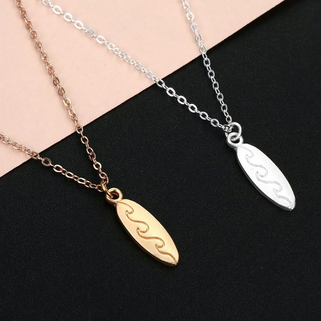 Blue Flow | Ocean Wave Surfboard Necklace š